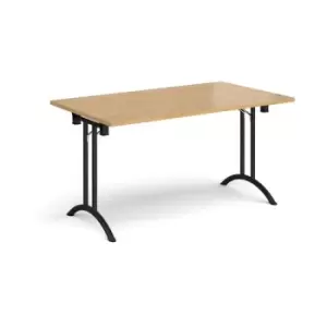 Image of Rectangular folding leg table with Black legs and curved foot rails 1400mm x 800mm - oak