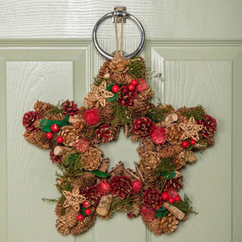 Image of 35cm Red Hanging Star Christmas Wreath with Red Berries and Pinecones