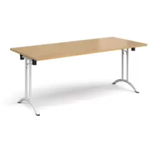Image of Rectangular folding leg table with white legs and curved foot rails 1800mm x 800mm - oak