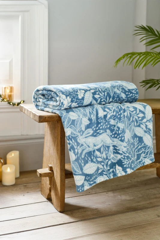 Image of Deyongs Deyongs Winter Forest 140x180cm Throw - Soft Printed Fleece Blanket - Woodland Animal Design in Mid Blue Size: 140cm x 180cm Mid Blue 140cm