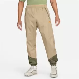 Image of Nike Windrunner Mens Woven Lined Pants - Green