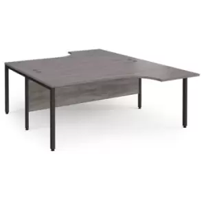 Image of Maestro 25 back to back ergonomic desks 1800mm deep - Black bench leg frame and grey oak top