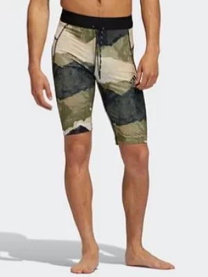 Image of adidas Earth Graphic Fitted Yoga Shorts, Black/Red, Size 2XL, Men