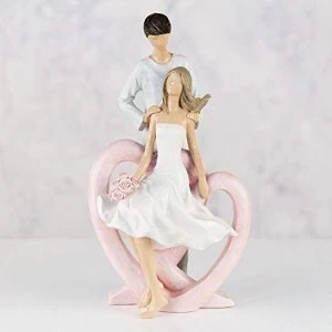 Image of Resin Figurine - Man Holding Lady with Flowers