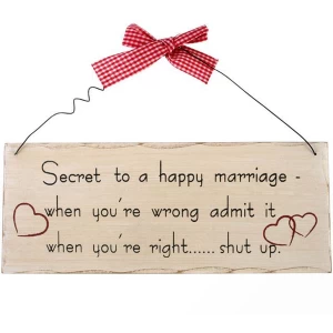 Image of Secret To A Happy Marriage Hanging Sign
