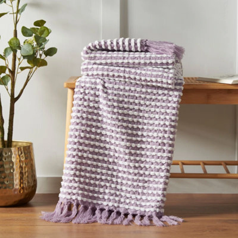 Image of Catherine Lansfield Catherine Lansfield 'Stab Stitch' Blanket Throw in Lilac Size: 125cm x 150cm Lilac 125cm x 150cm Unisex 5057681178059