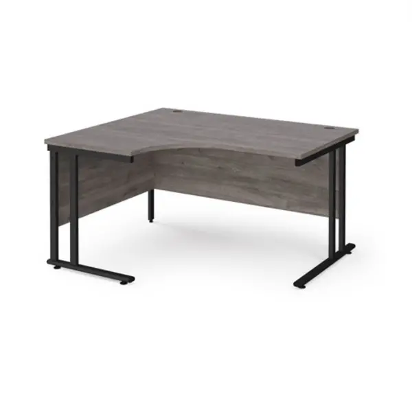 Image of Maestro 25 left hand ergonomic desk 1400mm wide - Black cantilever leg frame, grey oak top