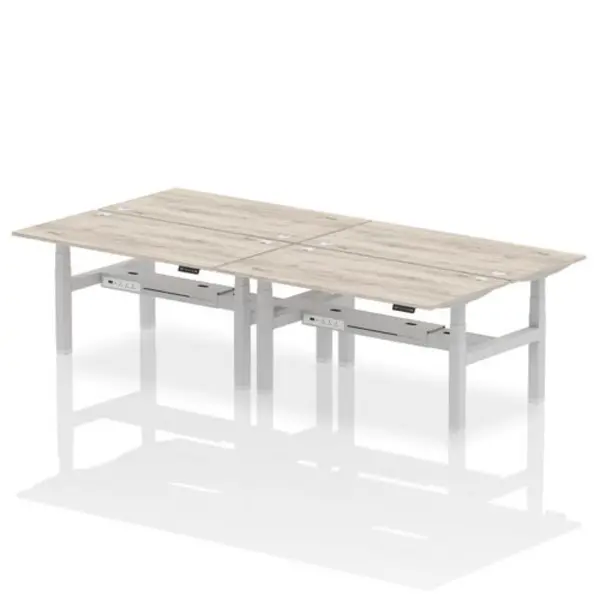 Image of Air Air Back-to-Back 1600 x 800mm Height Adjustable 4 Person Bench Desk Grey Oak Top with Cable Ports Silver Frame HASCP4P16800GRYS