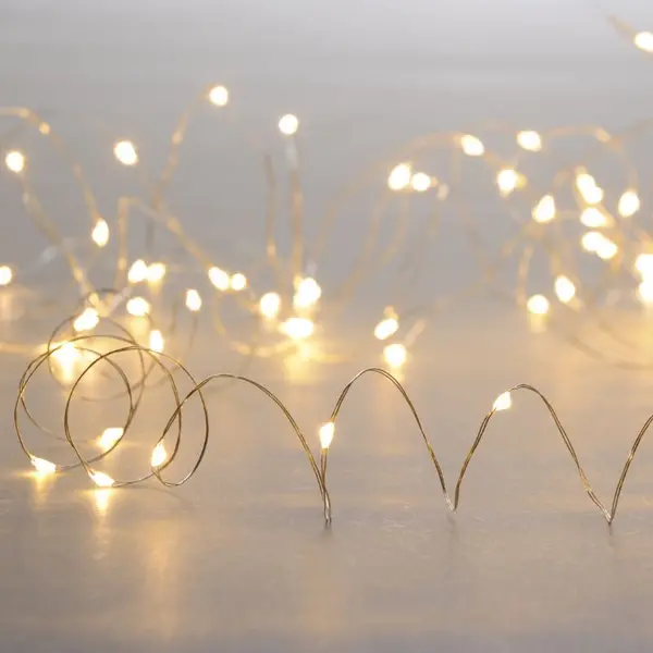 Image of Selected By Us Festive 9.95M Battery Operated Warm White LED Silver Micro Wire Fairy Lights - 200 Lights