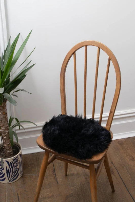 Image of Native Natural Sheepskin Chair Pad Round Black Size: 35cm x 35cm Black Unisex 35cm x 35 cm