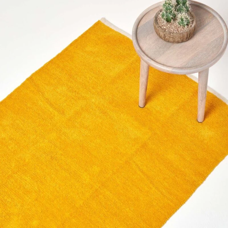 Image of Homescapes Mustard 100% Cotton Plain Chenille Rug With Natural Trim, 45 X 70 Cm