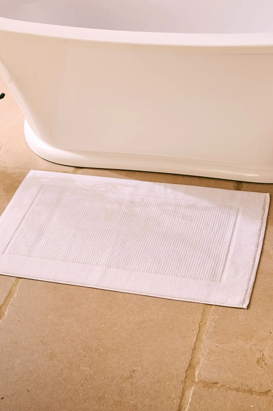 Image of Christy CHRISTY 'Supreme' Luxury 100% Cotton Towelling Bath Mats in White White One Size Unisex 5012448879877