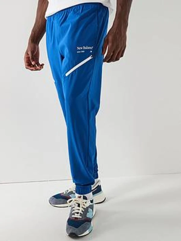 Image of New Balance Mens Closed Hem Woven Joggers - Blue Male S
