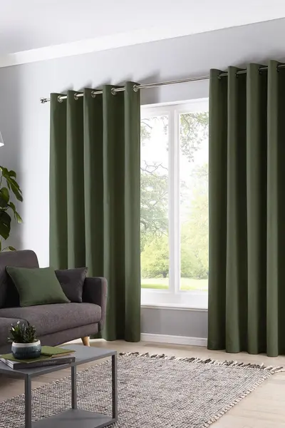 Image of Fusion 'Sorbonne' 100% Cotton Light Filtering Plain Dyed Eyelet Curtains Bottle Green