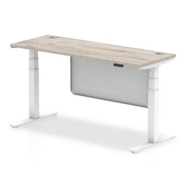 Image of Air 1600 x 600mm Height Adjustable Desk Grey Oak Top Cable Ports White Leg With White Steel Modesty Panel