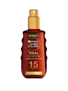 Image of Garnier Ambre Solaire Ideal Bronze Protective Oil Sun Cream Spray Spf15, Uva & Uvb Protection, 150ml (Save 32%)