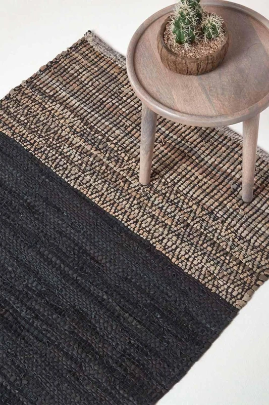 Image of Homescapes Black Recycled Leather Handwoven Herringbone Rug, 150 X 240 Cm