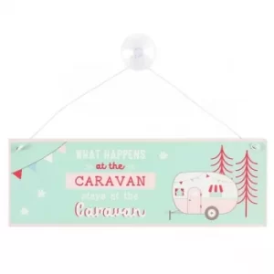 Image of What Happens at the Caravan Window Sign