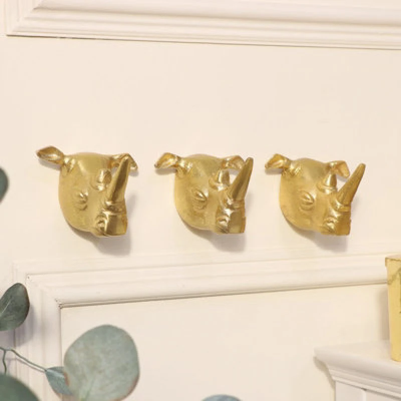 Image of Melody Maison Set Of 3 Gold Rhino Wall Hooks Metallic Gold