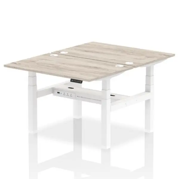 Image of Air Air Back-to-Back 1200 x 800mm Height Adjustable 2 Person Bench Desk Grey Oak Top with Cable Ports White Frame HASCP2P12800GRYW