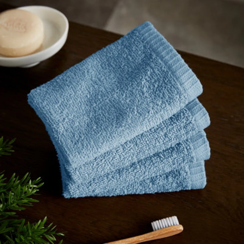 Image of Catherine Lansfield Catherine Lansfield 'Quick Dry' Face Cloth 4 Pack in Blue Size: Face Towel Blue Face Towel Unisex 5057681107110