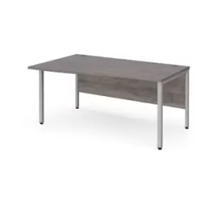 Image of Maestro 25 left hand wave desk 1600mm wide - silver bench leg frame and grey oak top