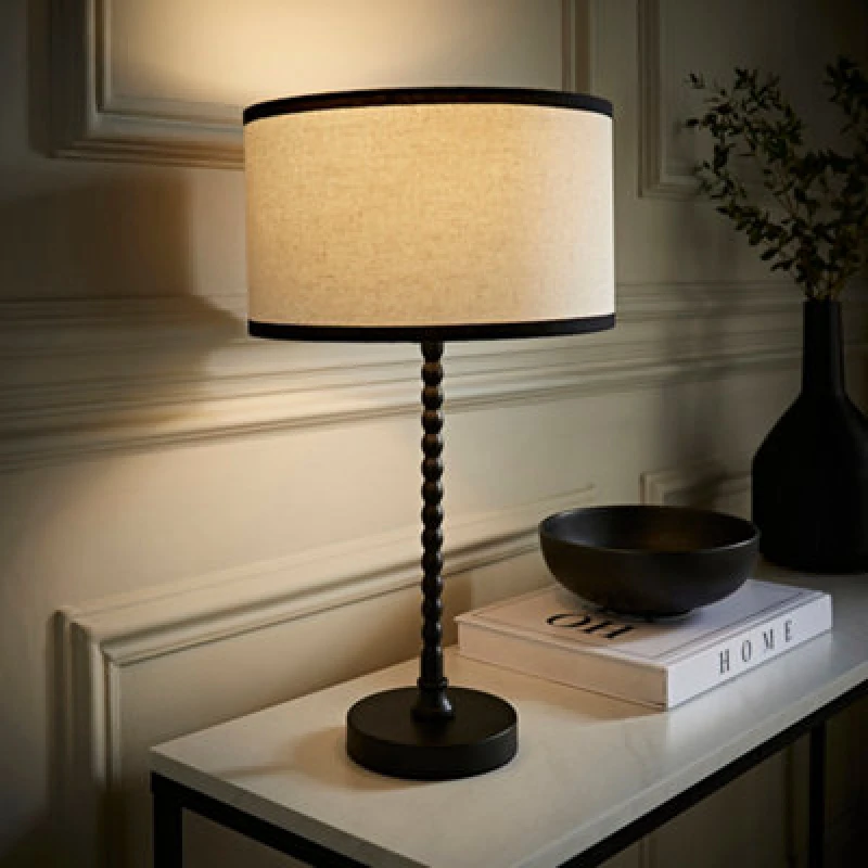 Image of ValueLights ValueLights Maeve Natural Linen Black Trim Drum Shade Matte Black Bobbin Table Lamp and Bulb Black One Size Unisex 5059406067440