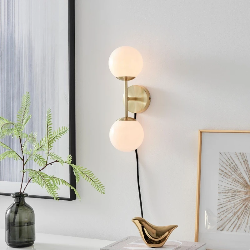 Image of FurnitureboxUK FurnitureboxUK Martha Brushed Brass Art Deco Wall Light With Opal Glass Globe Shades in Gold Gold One Size Unisex 5056542694424