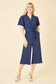Image of Navy Wrap Over Jumpsuit With Angel Sleeves