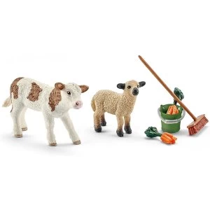 Image of SCHLEICH Farm World Stable cleaning kit with calf and lamb