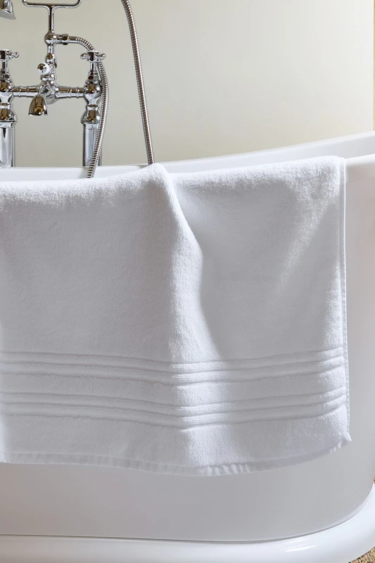 Image of Christy CHRISTY 'Serene' Pastel 100% Combed Cotton Bath Mat in White White One Size Unisex 5057241204242