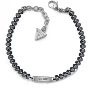 Image of GUESS midnight blue bead bracelet with rhodium plated logo plaque.