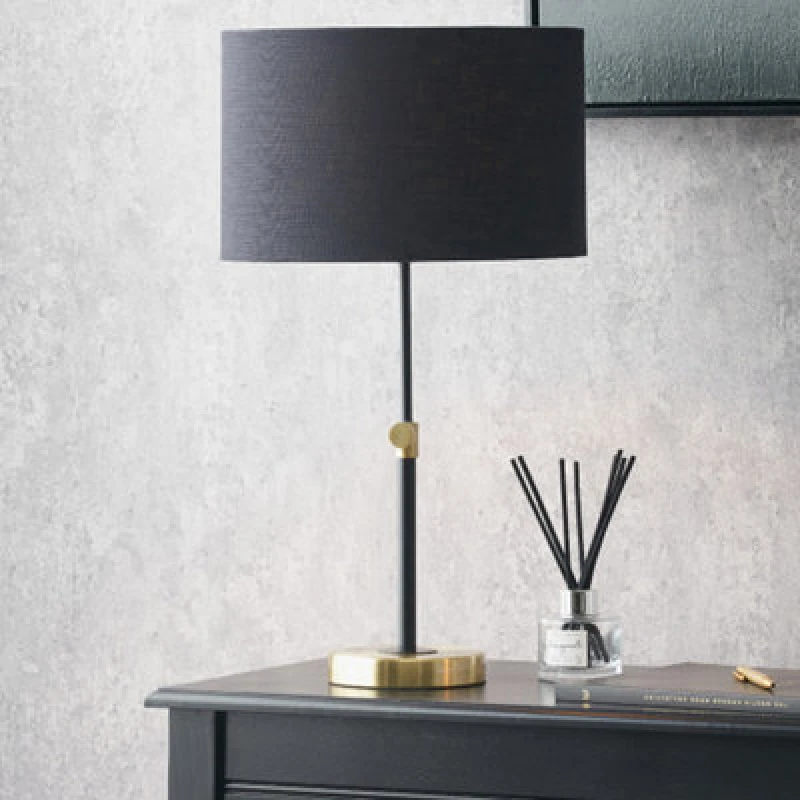 Image of Ruma Black and Gold Metal Rise and Fall Table Lamp Black