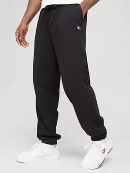 Image of Tommy Jeans Solid Logo Badge Relaxed Joggers - Black