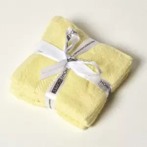 Image of HOMESCAPES Lemon 100% Combed Egyptian Cotton Set of 4 Face Cloths 500 GSM - Lemon