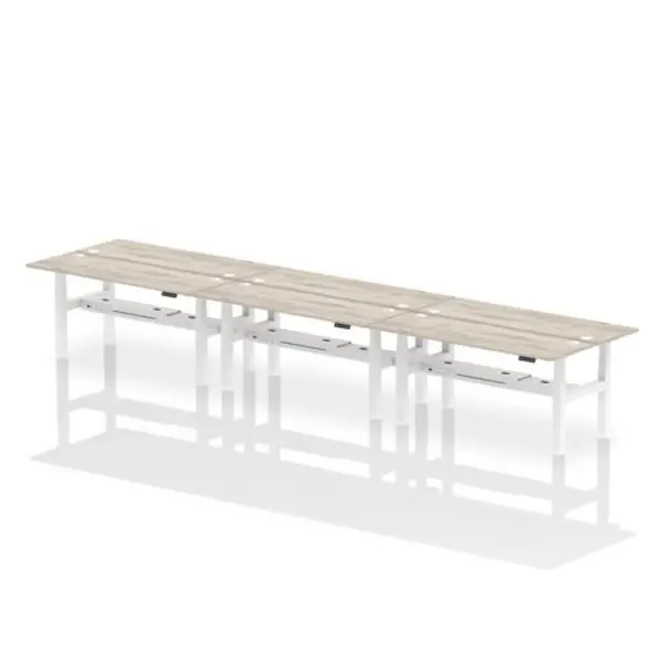 Image of Air Air Back-to-Back 1800 x 600mm Height Adjustable 6 Person Bench Desk Grey Oak Top with Cable Ports White Frame HASCP6P18600GRYW