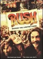 Image of rush beyond the lighted stage