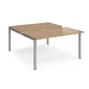 Image of Bench Desk 2 Person Starter Rectangular Desks 1400mm With Sliding Tops Oak Tops With Silver Frames 1600mm Depth Adapt