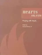 Image of hearts on fire praying with jesuits
