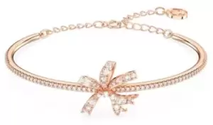 Image of Swarovski 5647565 Volta Bangle Bow, White, Rose gold-tone Jewellery