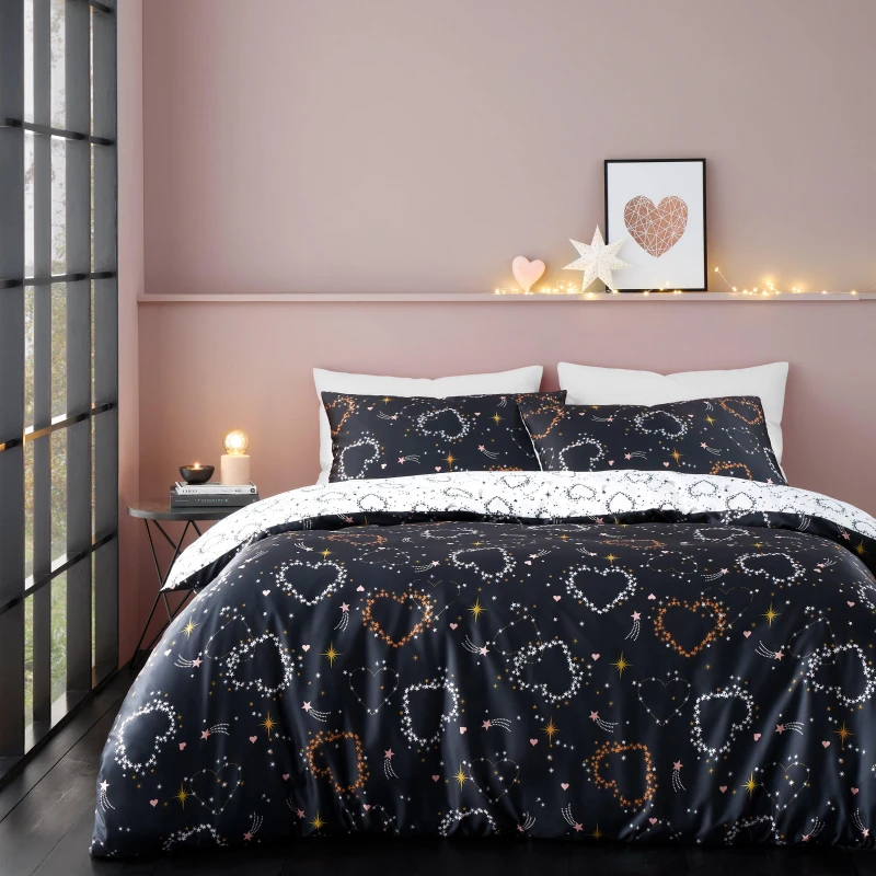 Image of Catherine Lansfield 'Cosmic Hearts and Stars' Reversible Duvet Cover Set Black