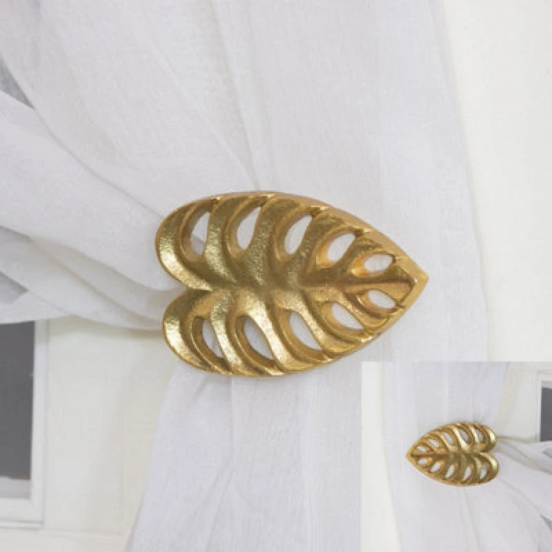 Image of Melody Maison Pair Of Gold Monstera Leaf Curtain Holdbacks Gold