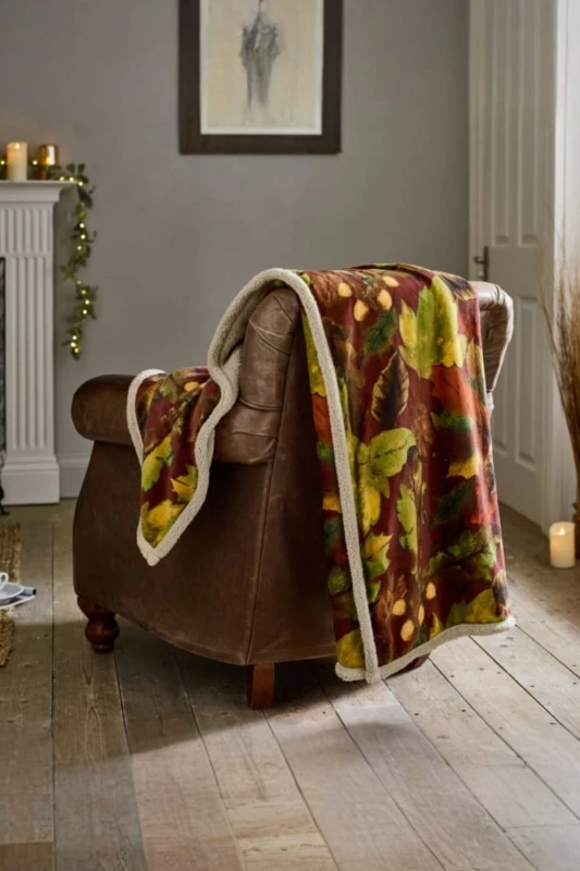 Image of Deyongs Deyongs Luxury Soft Cosy Warm Fleece Sherpa Throw Winter Leaves Rust 130x170cm in Burnt Orange Size: 130cm x 170cm Burnt Orange 130cm x 170c