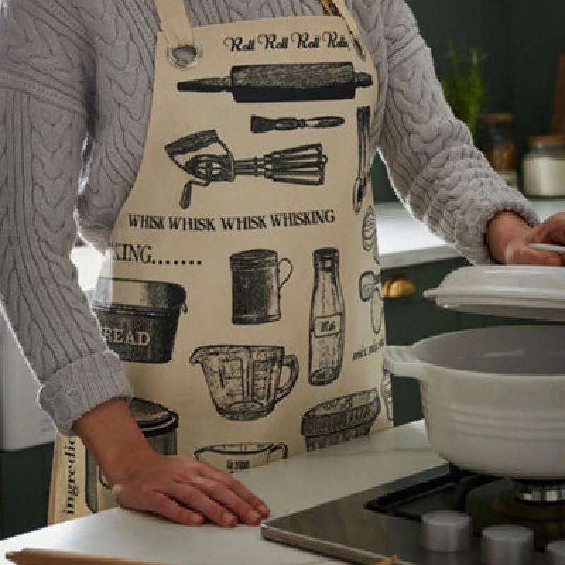 Image of Ulster Weavers 'Baking' Graphic Print PVC/Oil cloth Apron Beige