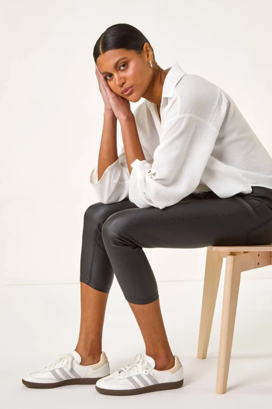 Image of Roman Womens Metallic Coated Crop Jeggings in Black Size: 12 Black Female 12