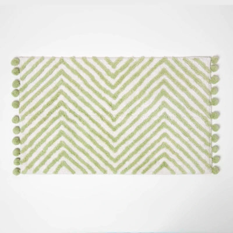 Image of Homescapes Bath Mat Tufted Zig Zag 100% Cotton with Pom Pom Edges Green