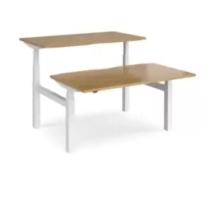 Image of Height Adjustable Desk Back To Back Rectangular Desks 1400mm Oak Tops With White Frames Elev8 Touch