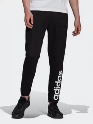 Image of adidas Essentials Fleece Tapered Joggers, Blue Size M Men