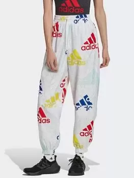Image of adidas Essentials Multi-colored Logo Loose Fit Woven Tracksuit Bottoms, White Size M Women