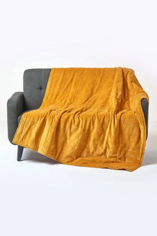 Image of Homescapes Velvet Quilted Throw 100% Cotton, Soft & Luxurious Blanket in Mustard Size: 150cm x 200cm Mustard Unisex 150cm x 200 cm